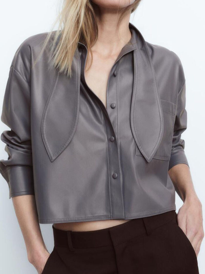 Bowknot is acted the role of imitation leather shirt