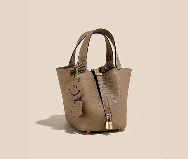 First layer of cowhide handbags with a smiling face