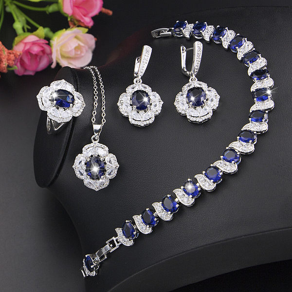 Four-piece jewelry set (necklace + earrings + ring + bracelet)
